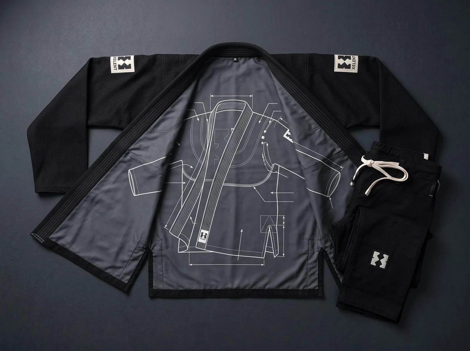 Black BJJ Gi, Custom Embroidered Jiu Jitsu Kimono, Custom OEM 450 GSM Pearl Weave Jiu Jitsu Kimono, Wholesale Manufacturer — front view