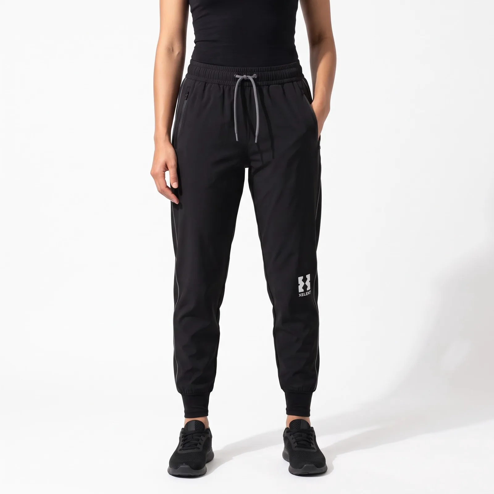 Modest Double-Layer Running Joggers Polyester Spandex Zip Pockets Reflective Custom Logo OEM Wholesale — front view
