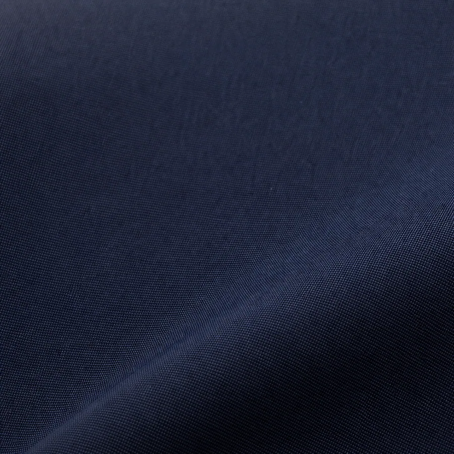 AI-generated representative macro of 3-layer waterproof laminate showing its visible face structure